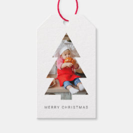 Minimalistiska julklappstaggar med julgran beskure presentetikett