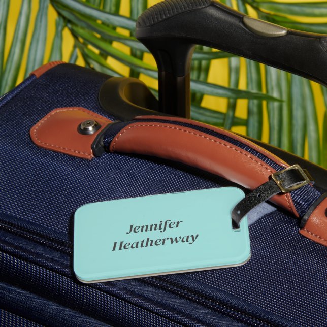 Minimalistiskt anpassat namn för akvblått bagagebricka (Framsida Insitu 3)