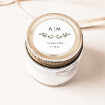 Minimalistiskt flytande | Monogram Bröllop Runt Klistermärke<br><div class="desc">Trendigets botaniska bröllopsmärken har ett enkelt,  minimalistiskt gren av grönt med vattenfärg löv med initialer eller monogram på en ren vit bakgrund.</div>
