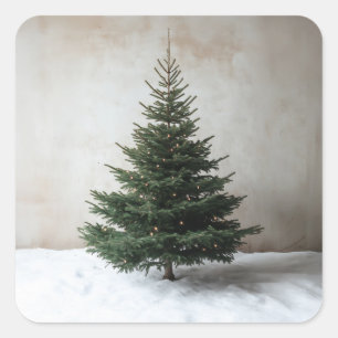 Minimalistiskt Julgran med Soft Ljus på Snö Fyrkantigt Klistermärke