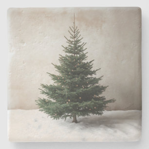 Minimalistiskt Julgran med Soft Ljus på Snö Stenunderlägg