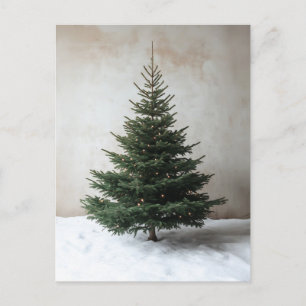 Minimalistiskt Julgran med Soft Ljus på Snö Vykort