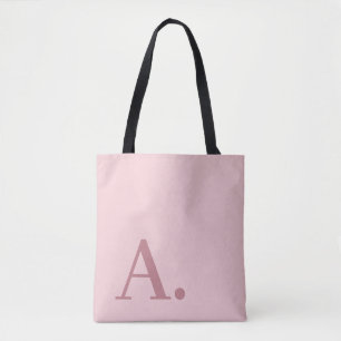 Minimidesign med ett stort modernt monogram Ro Gul Tygkasse