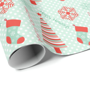 Mintgrönt- och koralljul som slår in papper presentpapper