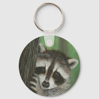 MisChief Raccoon uppåt i en nyckelkedja i Träd Nyckelring