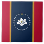 Mississippi State Flag on Tile Kakelplatta<br><div class="desc">Celebrate the spirit of the Magnolia State with this elegant tile featuring the Mississippi State Flag! This decorative tile showcases the official flag of Mississippi, adopted in 2020, with its powerful imagery and bold colors. At the center is a graceful white magnolia blossom—representing peace, hospitality, and resilience—encircled by 20 white...</div>