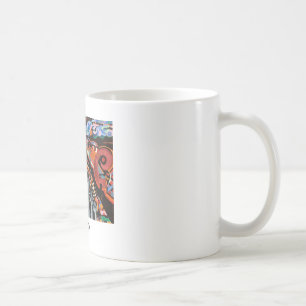 Mitt i kaos, reser jag mig kaffemugg