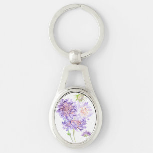 mjöliga blommor ovalt silverfärgad nyckelring