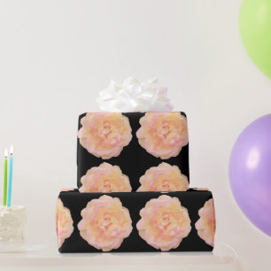 Mjuk persikofärgad Rosa Gul ros design över svart Presentpapper