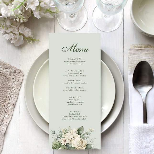 Mjuk Saloblomster Bröllopsmeny Meny (Soft Sage Green Floral Wedding Menu on an elegant wedding table)