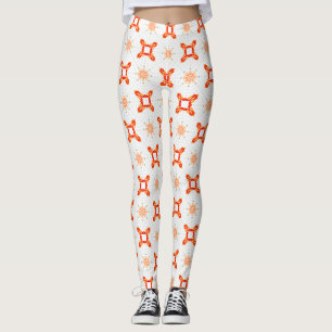 Mjuka orange-röda blommiga och ram-mönstrade Leggi Leggings
