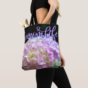 Mjuka rosa gult lila av blommor i vattendrag tygkasse
