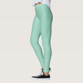 modell som bär högmidjade mintgröna leggings
