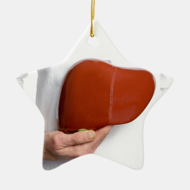 Modellerar hållande människalever för kvinnan på julgransprydnad keramik (Framsidan)