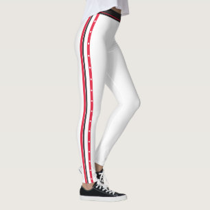 Moderiktig sidorandmode knäppas röd vitsvart leggings