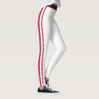Moderiktig sidorandmode knäppas röd vitsvart leggings