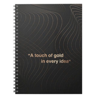 Modern bärbar dator med en liten bit guld glitter anteckningsbok