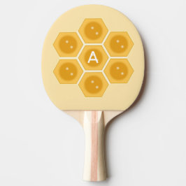 Modern bikaka och monogram på elfenben pingisracket