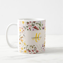 Modern blommigt av vildblommor, färgad monogram kaffemugg