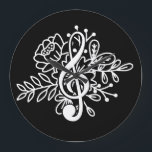 Modern Blommigt Treble Clef Black Music Älskare Stor Klocka<br><div class="desc">Modern Black Blommigt Treble Clef Music-väggklocka med en tredubbel klyva omgiven av blommor. Underbar gåva till musiker älskare,  musiker,  musikvaror eller ge som en gåva till en musiklärare.</div>