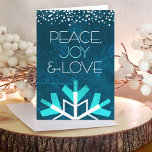 Modern Blue Snowflake Peace Joy Kärlek Typography Helgkort<br><div class="desc">"Fred, glädje och kärlek." En stor, roligt, lekfull, vit och turkotisk snöflingillustration och modern typografi på en rik, djupa, blå marmorblå vattenfärgsbakgrund hjälper dig att hoppa in i julhelgen. En vit och turkos konfetti prick gräns ramar överst. Din personlig hälsning finns på insidan. Känn helgdagarnas värme och glädje när du...</div>