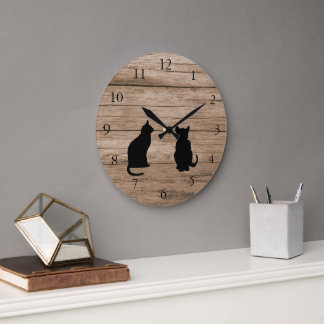 Modern cat silhouettes on rustic dark wood stor klocka