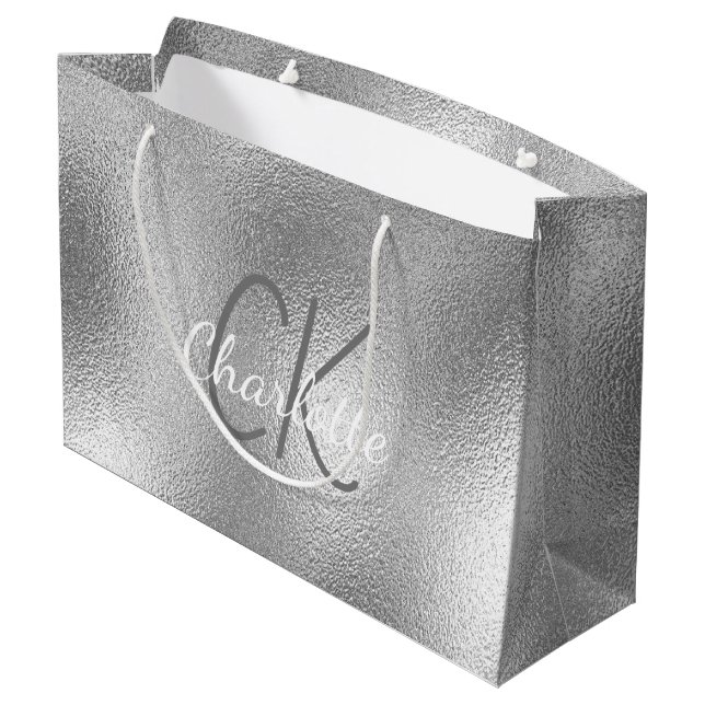 Modern elegant metallmonogram i silver (Baksidan Vinklad)