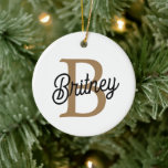 Modern Elegant Monogram Namn Black Guld Julgransprydnad Keramik<br><div class="desc">Modern Elegant Monogram Namn Black Guld Keramic Ornament är en förfinad dekoration och snyggt. Den har en slimmad svart bakgrund med ett elegant guld-skript i monogrammet namn, vilket ger lyxen och personalisering. Den här keramiska prydnadsprodukten är perfekt för helgdag eller som en minnesvärd keepé och kombinerar modern design med klassisk...</div>