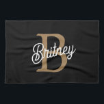 Modern Elegant Monogram Namn Black Guld Kökshandduk<br><div class="desc">Den moderna Eleganten Monogram Namn Black Guld-skrikthanddumet är en chic och ett funktionellt tillbehör till vilket kök som helst. Den har en svart snyggt med elegant guld-skript, anpassade med monogram och namn, som ger en personlig beröring. Den här kökshandduken är tillverkad av högkvalitativ, absorberande väv och är perfekt för torkning...</div>