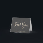 Modern Elegant Script Black Beige Custom Wedding  Tack Kort<br><div class="desc">This folded thank you note card features elegant script lettering on a soft black background with the couple’s names printed below for a simple and modern wedding stationery design. The clean layout feels timeless and sophisticated while keeping the focus on your message of appreciation. It’s perfect for thanking friends and...</div>
