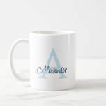 Modern handskriven Elegant Monogram & Namn Kaffemugg<br><div class="desc">Börja din dag med en personlig beröring med den här snyggten monogram namn mugg, med ett fet inledande i mjuk blått bakom ett handskript namn på mörk blått i eleganten. Den moderna designen ger en smidig och contemporaryn känner perfekt för hemmet eller kontoret. Vare sig du lägger ut det på...</div>