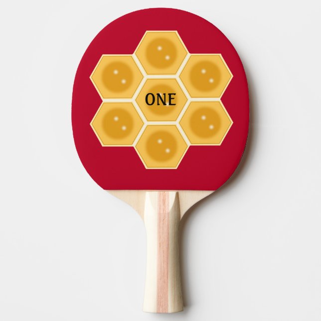 Modern honungskaka på burgunderröd pingisracket (Framsidan)