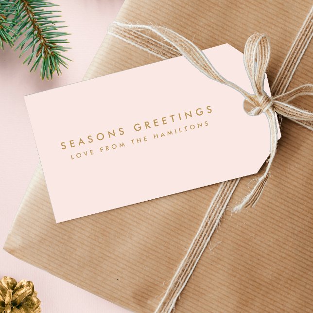 Modern jul |  Rosa och minimalt Guld Presentetikett (“Seasons Greetings” Christmas gift tags by Guava, featuring gold text on soft blush pink background)