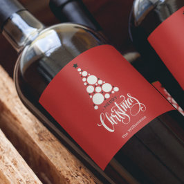 Modern julgran på röd vinflaska etikett