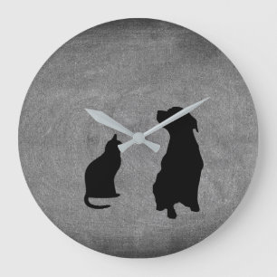 Modern katt & hund. silhouetteshusdjur på den stor klocka