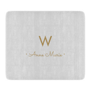 Modern ljusgrå guldskriftmonogram