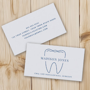 Modern logotyp med minimal blå tandläkarklass visitkort