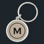 Modern Minimal Beige Black Monogram Rund Silverfärgad Nyckelring<br><div class="desc">Personlig Modern Minimal Monogrammed Keychain Monogram Initial Beige Black. Perfekt som helgdag,  familjeåterförening är en tjänst,  tack för marskalkar och gåva för särskilda tillfällen.</div>