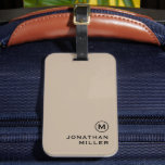 Modern Minimal Beige Monogram Bagagebricka<br><div class="desc">Modern bagagemärkesdesign har en enkel beige monogrammedaljon med ditt monogram initialt och namn i klassiskt svart typografi för en enkel snyggt professionell.</div>