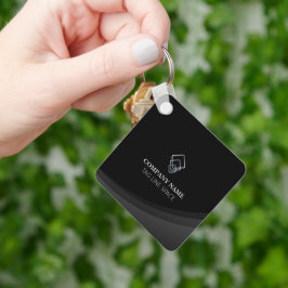 Modern minimal typografi svart nyckelring