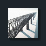 Modern Minimalist Architectural Bridge - Infinite  Canvastryck<br><div class="desc">A stunning digital artwork featuring a massive steel truss bridge stretching into an infinite, misty horizon. The composition utilizes a powerful diagonal perspective, showcasing the intricate geometric patterns of the industrial ironwork against a clean, minimalist background. Ideal for modern office spaces, industrial-themed interiors, or anyone who appreciates architectural precision and...</div>