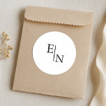 Modern Minimalist Wedding  Runt Klistermärke<br><div class="desc">Add a refined finishing touch to your wedding stationery with this modern minimalist sticker featuring your custom monogram initials. Ideal for sealing envelopes, wrapping belly bands, or decorating favor bags and gifts, this elegant round sticker coordinates beautifully with your full wedding suite. Designed with simple serif typography and a timeless...</div>