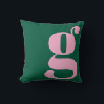 Modern Monogram Initial Letter Preppy Pink Green Kudde<br><div class="desc">This preppy monogram pillow features an oversized lowercase initial in pink against a deep green background. The bold, modern letterform adds personality and charm to teen rooms, dorms, and cozy spaces. Its clean, stylish look makes it easy to mix with colorful decor or classic prep accents. A fun, expressive design...</div>