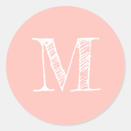 Modern monogramstämpel i pastellrosa runt klistermärke