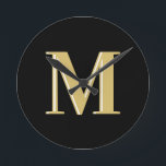 Modern monogramtypografi, svart guld rund klocka<br><div class="desc">Modern monogramtypografi,  svart guld</div>