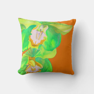 Modern orchid-popkonsblomma på orange kudde