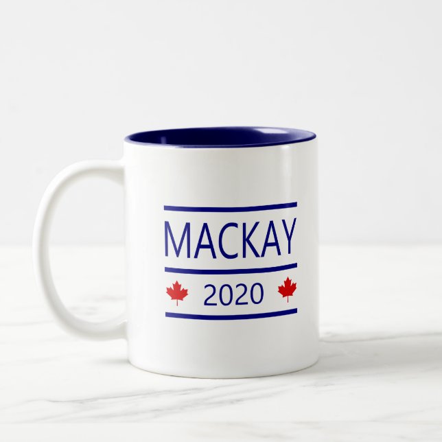 Modern Peter MacKay 2020 med Maple Löv Färg Två-Tonad Mugg (Vänster)
