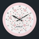 Modern Pink Black Geometric Triangle Pattern Stor Klocka<br><div class="desc">Modern minimalist wall clock with a geometric triangle pattern in soft pink, black and white tones. The clean design features bold black numbers and hands framed by a delicate pink and white circular border. The word “Geometry” adds a stylish contemporary touch, making this clock perfect for modern interiors, Scandinavian decor,...</div>