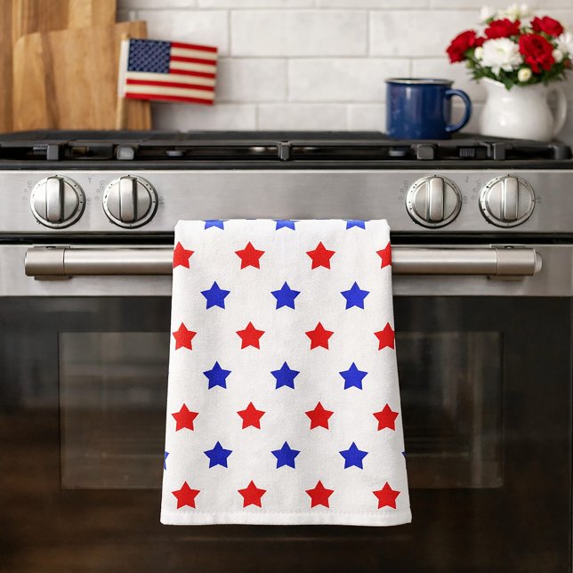 Modern röd och blå stjärnmönster kökshandduk (A kitchen towel with red & blue star pattern on a white background.)