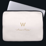 Modern rosabruten guldmonogram i skrivstil laptop fodral<br><div class="desc">En modern,  elegant monogramdesign med guld,  handskriven minimalistisk skrivstilstypografi och sans serif blocktypografi på en elegant,  blek,  pastell rosabruten bakgrund. Monogrammet och namnet kan enkelt anpassas.</div>